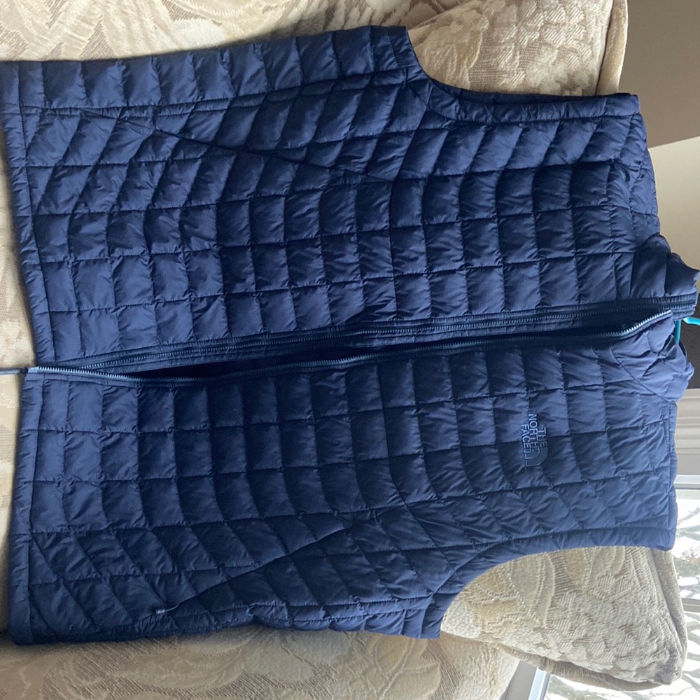 The North Face puffer jacket, it is like brand new and never worn